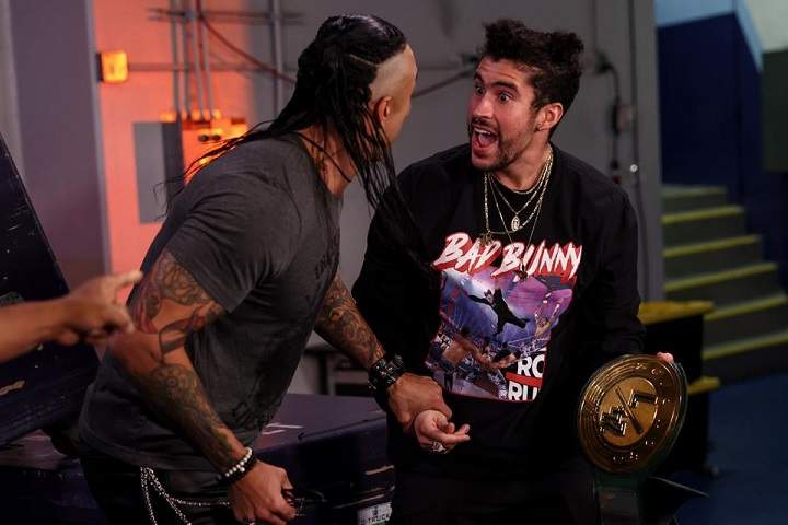 Bad Bunny Shows Up With 24/7 Championship During His Perform...