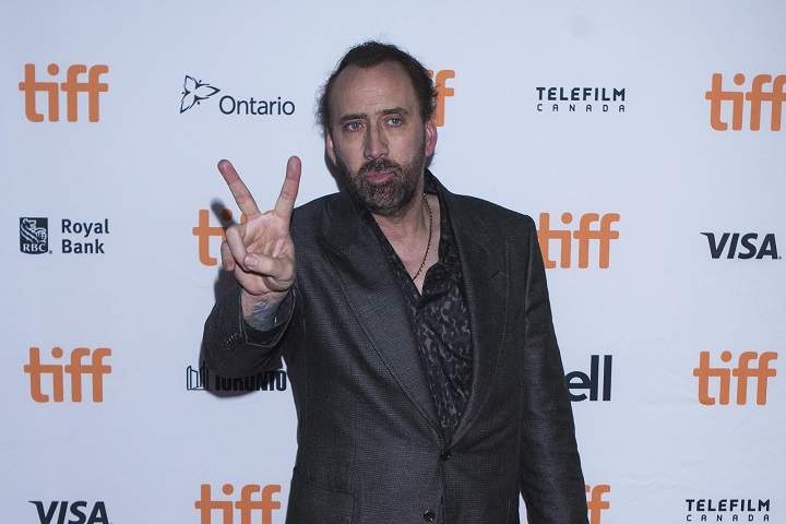 Nicolas Cage spotted holding hands with mystery 'girlfriend'