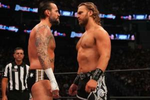 WWE Hall Of Famer Booker T Comments On The CM Punk-Adam Page Situation